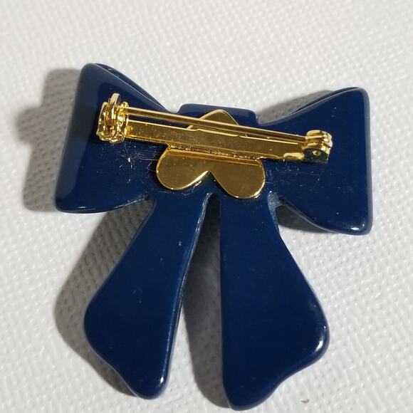 Vintage blue bow brooch (looks green under black light) - Picture 10 of 11